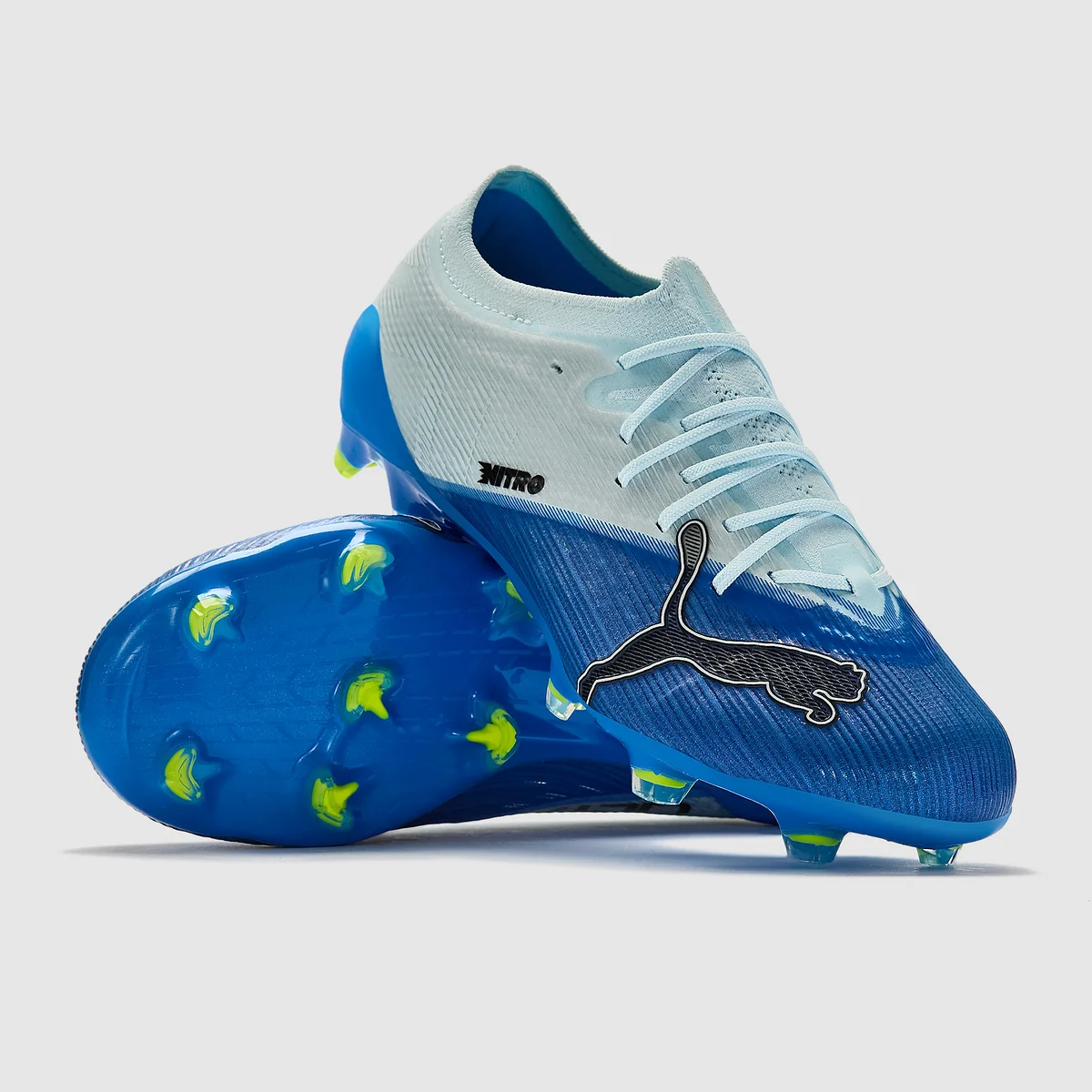 Kopačky Puma Ultra Nitro 7 Pro FG bílá/modrá