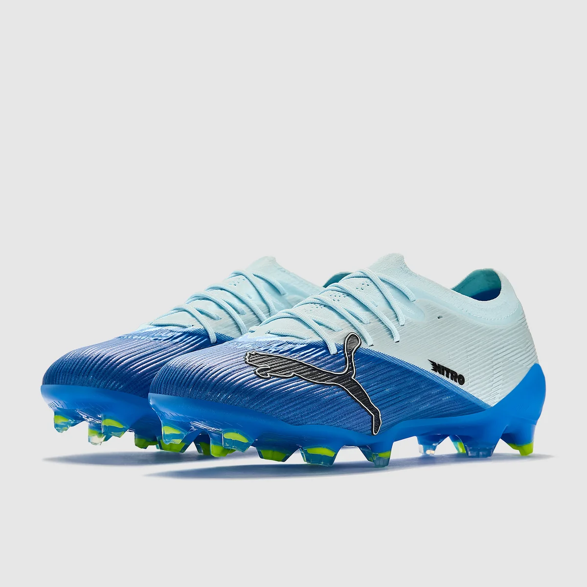 Kopačky Puma Ultra Nitro 7 Pro FG bílá/modrá