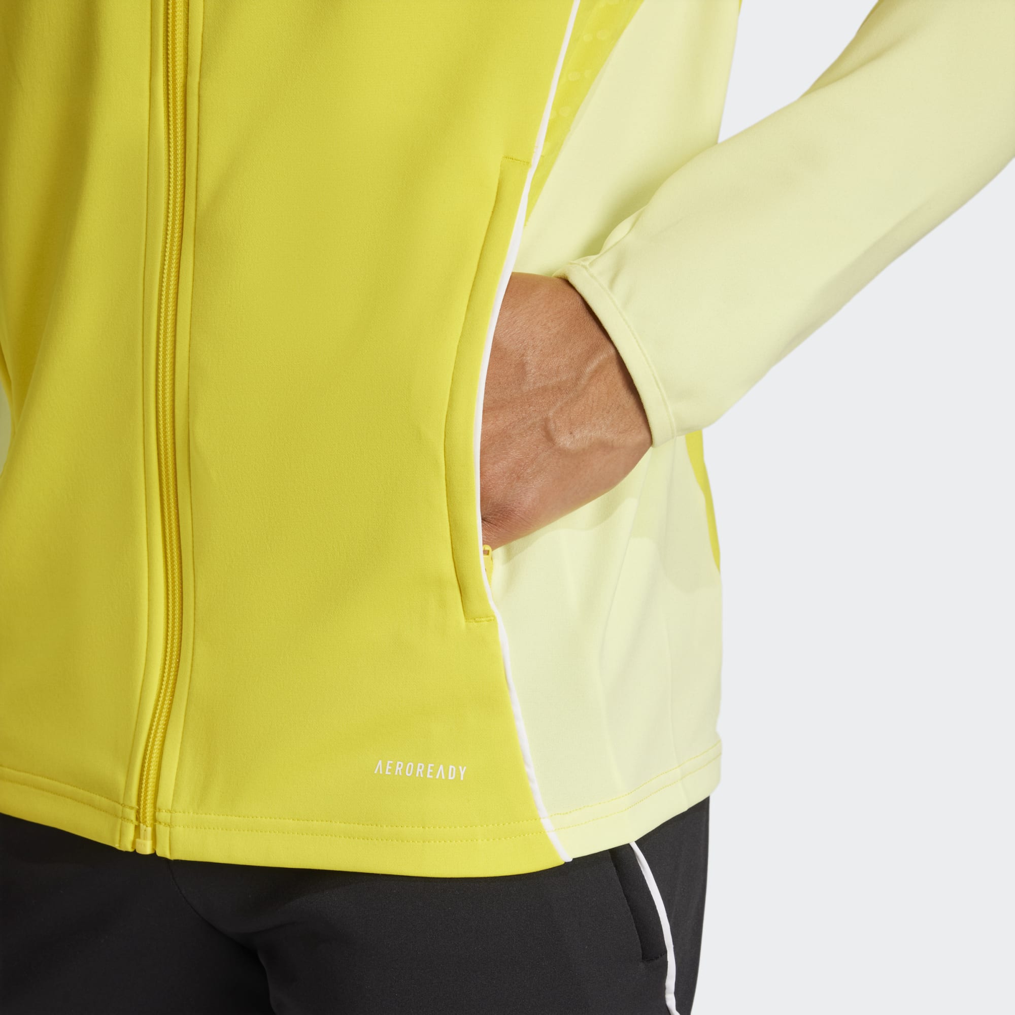 Tepláková bunda TIRO25C TR JKT žlutá