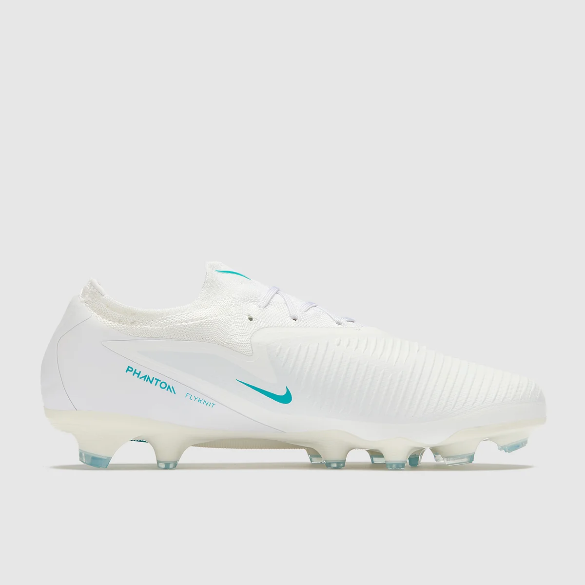 Kopačky Nike Phantom 6 Low Pro FG bílá/modrá
