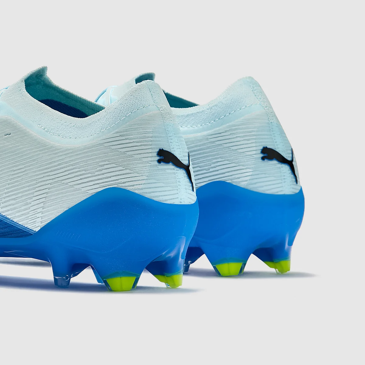 Kopačky Puma Ultra Nitro 7 Pro FG bílá/modrá